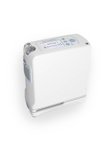 Der kompakte und tragbare Sauerstoffkonzentrator Inogen One® G4 (Hersteller Inogen), vertrieben von PMT Medizintechnik GmbH, zeigt sein kleines, weißes Gehäuse mit Display und Bedientasten.