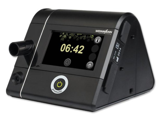 Das moderne und leise CPAP-Gerät Weinmann prisma20C (Hersteller Weinmann), vertrieben von PMT Medizintechnik GmbH, zeigt sein schwarzes Gehäuse mit Farb-Touchscreen und Bedientasten zur Schlafapnoe-Therapie.